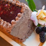 A Hazelnut-Marionberry Torte with Mocha Buttercream for Two August Birthdays