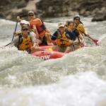 A raft heads through one of the many rapids on the Rogue River.