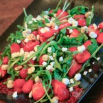 Arugula salad with strawberry champagne vinaigrette