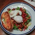 Warm Chanterelle Salad with Speck, Poached Eggs and Marsala Vinaigrette