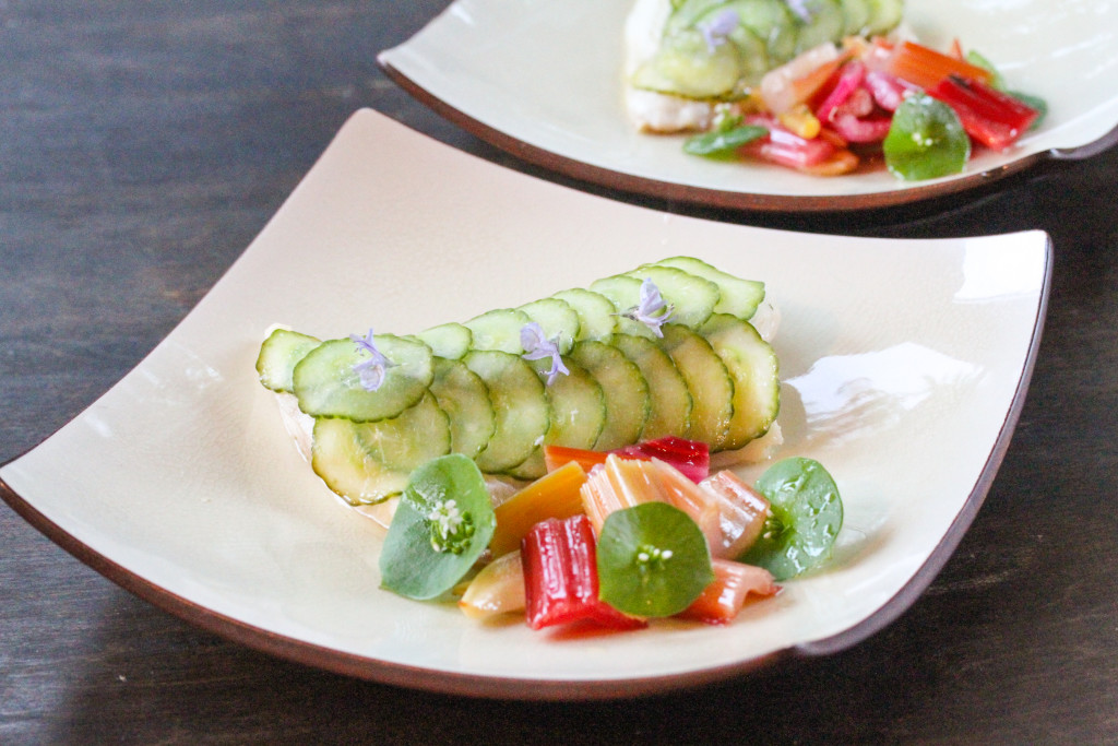 Cod layered with cucumber slices and poached in a butter-wine sauce and served with a side of blanched rainbow chard simply dressed in olive oil and white wine vinegar.