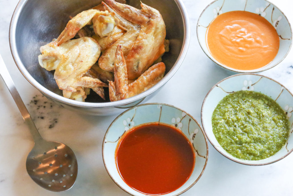 Three tasty sauces make for a high-flying chicken wing recipe.